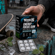 Rivox Energy + Focus Gum Peppermint Rush held outdoors with a skateboard